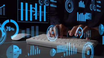 A close-up image of hands typing on a keyboard surrounded by dynamic visual data elements, representing the integration of technology and business analytics for decision-making. Xenic