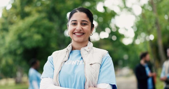 Face, volunteer or woman outdoor with arms crossed for eco project, outreach or nonprofit service. Confident, person or charity work in park for sustainability program, social responsibility or bokeh