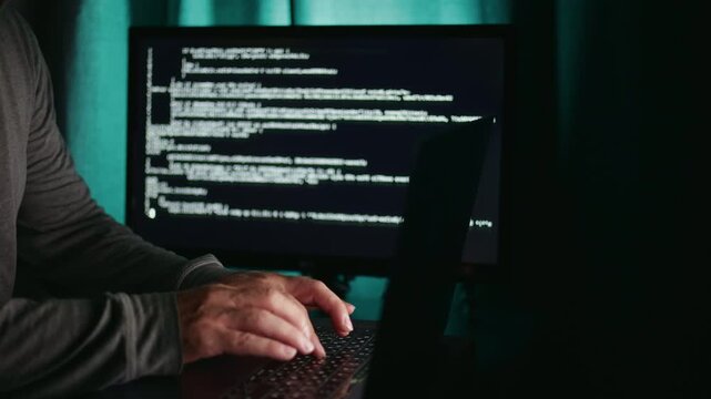 Analyst examines data, Analyzing logs and interpreting patterns, Reviewing information with visualization under ambient lighting, Inspecting data and graphs in softly lit environment for insights