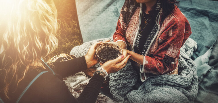 Ceremony in nature, women ceremoniously paint themselves with ash.