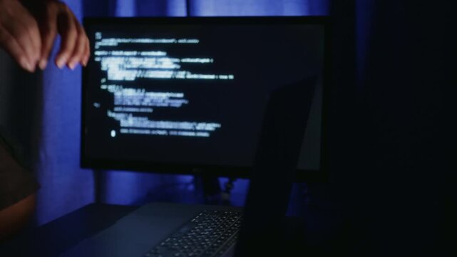 Coding troubleshooting session Expert technician working diligently to resolve software malfunction problems swiftly Software developer deeply engaged urgent debugging process to rectify code faults
