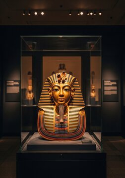 Stunning golden mask of Tutankhamun showcased inside museum display case