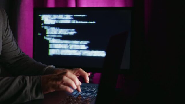 Security analyst analyzing digital logs, Expert examining computer code during urgent incident response, Forensic expert scrutinizing digital traces amid tense cybersecurity crisis response situation