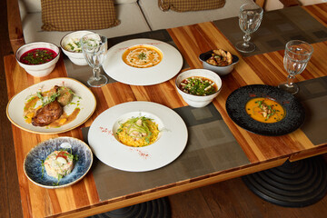 A Delicious Culinary Spread Presented on an Elegant Dining Table for Everyone to Enjoy