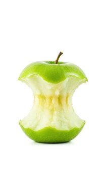 Fresh, bright green apple with a noticeable bite taken out, isolated on a stark white studio background, emphasizing healthy eating, bitten, object, harvest