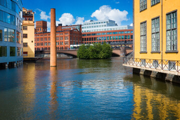Old industrial area on the Motala ström river in the city centre of Norrköping, Sweden