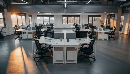 Modern Workspace: A contemporary office space, bathed in natural light, showcases rows of sleek desks and ergonomic chairs, evoking an atmosphere of productivity and innovation.