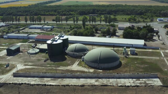 Aerial view of a biogas plant with digesters and renewable energy systems
