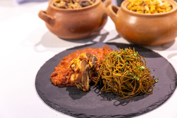 Carapulcra with dry soup and pork rinds. Traditional food from the regions of Peru.