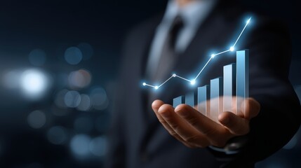 Person holds bar graph and line chart showing growth and positive trends symbolizing success in business and financial markets