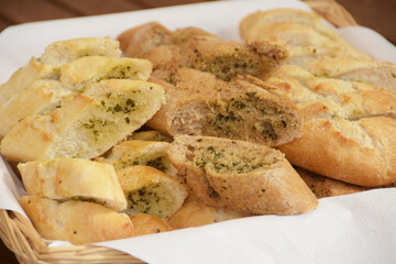 Baguette bread filled with herbs flavored butter
