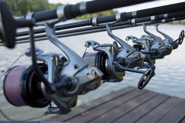 Multiple fishing rods and reels - rear view
