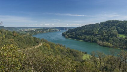 Naklejka premium View of the Moselle River from a hiking trail, scenic nature and bridge, seasonal change