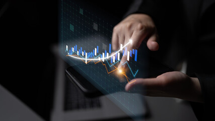 A businessperson uses a smartphone to analyze financial data, showcasing graphical trends in a modern office setting, illustrating the importance of data analysis in decision-making. Impute