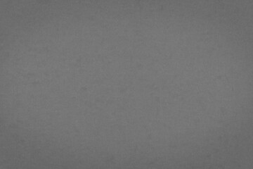 Grey paper texture background closeup.