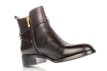 Leather women's demi-season boots isolated on white background, close-up