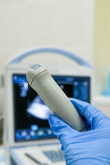 An ultrasound probe on a veterinary scanner, ready for animal examination. Concept diagnostic imaging