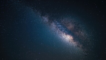Fototapeta premium Breathtaking night sky capture showcasing the Milky Way with a grainy texture in a long exposure shot
