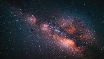 Obraz premium Milky Way Galaxy photographed with grainy texture, soft focus, and blur due to elevated ISO, extended exposure, and large aperture settings.