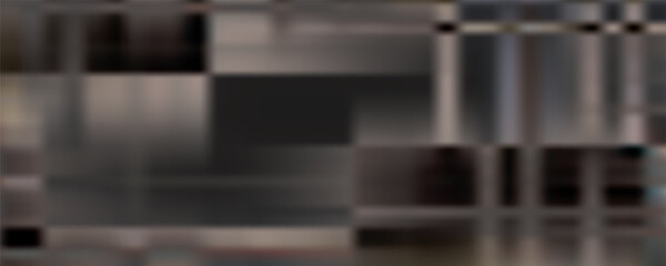 a blurred texture with a wavy, layered pattern in shades of brown and beige. The image has a soft focus, emphasizing the natural, organic flow of the lines.