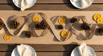 Beautiful rustic outdoor dining table with a festive burlap runner, adorned with natural pinecones and dried orange slices, perfect for autumn or holiday gatherings