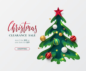 A realistic paper cut-out layered green Xmas tree, red star topper, golden shining stars, and Christmas tree balls are on a holiday seasonal sale banner. Vector festive discounts offer templates.
