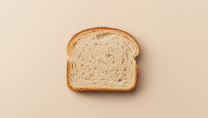 Single slice of bread on a plain surface, potential for a fiber-rich meal