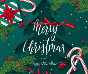 A vector paper-cut Xmas tree, fir branches, holly berries, red ribbons, a gift box, candy canes, and the text Merry Christmas on a green background are in this festive banner. Holiday greeting card.