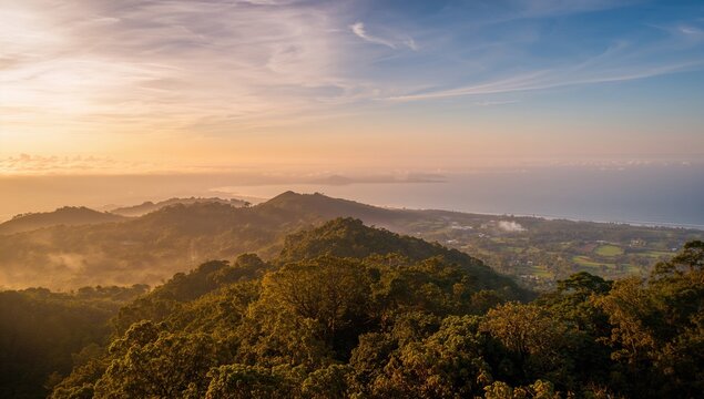 Misty morning sea view, natural landscape with lush greenery and blue sky, ideal for travel themes