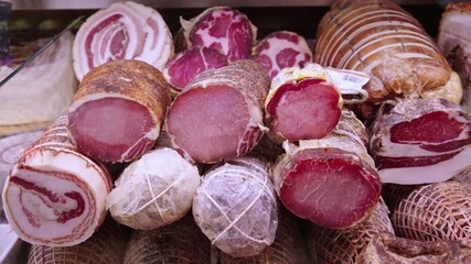 Discover delicious sausage meat deli ham varieties in local shop display