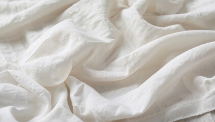 Fototapeta premium White bedding sheets texture ideal for editorial header background, fabric, pattern