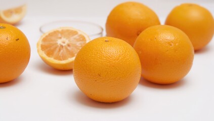 Yellow tangerines set against a white backdrop, vibrant fruit choice for healthy snacking