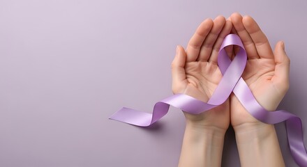 Hands gently holding a lilac ribbon symbolizing support and awareness for a cause
