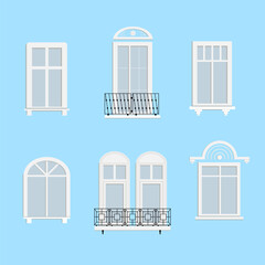 A set of windows and balconies in a classic style with decorative elements and wrought iron railings.