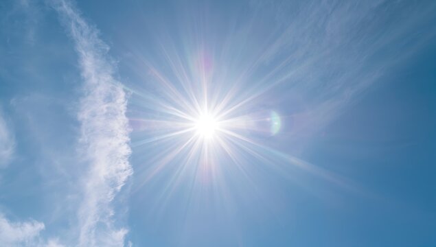 Solar lens flare, enhancing visual depth in natural photography