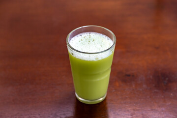 A refreshing and energizing glass of iced sugarcane juice.