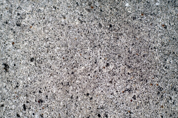 Rough Gray Concrete Surface with Small Dark Speckles