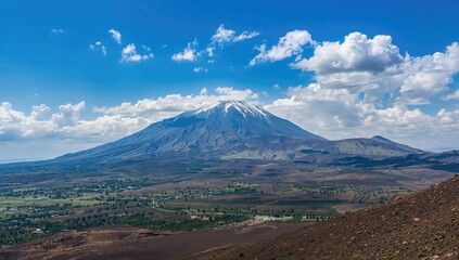 Obraz premium Volcano Teide surrounded by a clear blue sky, geological landmark observation
