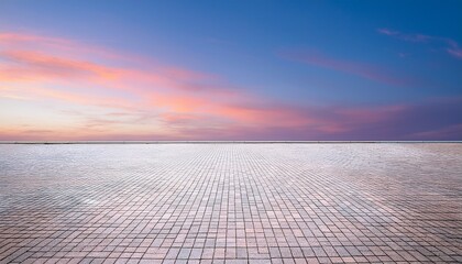 empty white paved area under pastel sky