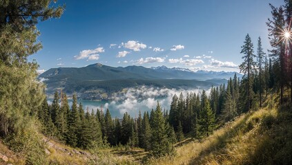 Obraz premium Mountain panorama viewed from a rural road at a national forest, showcasing seasonal change