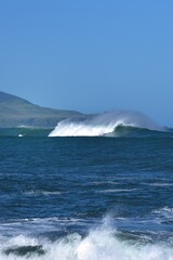 Storm waves bringing in the floating debris