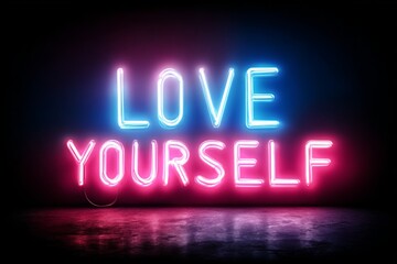 Neon sign displaying love yourself with vibrant pink and blue light reflections on the floor