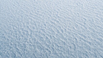 Uniform layer of snow covering a flat expanse, seasonal change