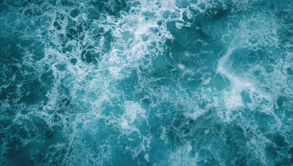 Abstract blue sea water with white foam, suitable for editorial header background