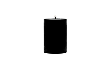 A black pillar candle with a flickering flame casts a soft glow in the darkness, creating a serene and peaceful atmosphere  isolated on transparent background