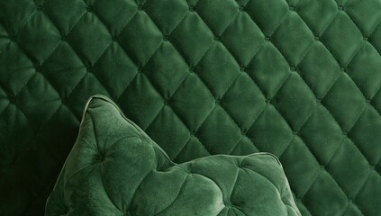 Obraz premium Quilted green velvet fabric backdrop, suitable for editorial header background