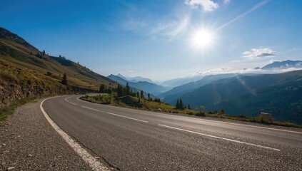 Naklejka premium Sunny day on a road surrounded by the Ukrainian Carpathian Mountains, highlighting seasonal change
