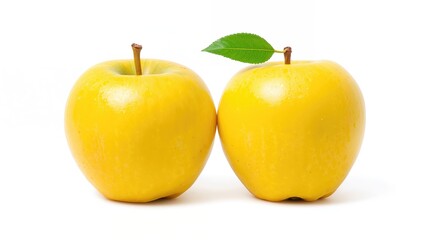 Pair of yellow apples with green leaves on a white backdrop. Golden apples with cutout path. Complete Depth of Field