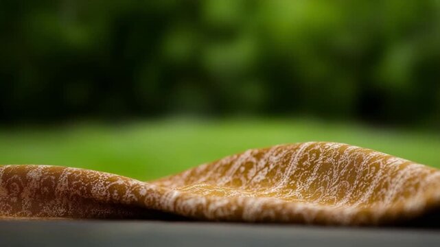 Unveiling Textural Elegance: A close-up view presents a delicately textured surface, its subtle variations and nuanced colors inviting tactile exploration and sensory appreciation.