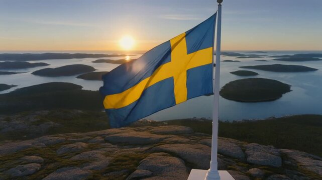 Sweden Flag Waving on Rocky Mountain Summit at Golden Hour Over Archipelago